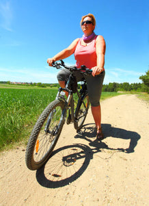 Overweight woman on and Electric bicycle.